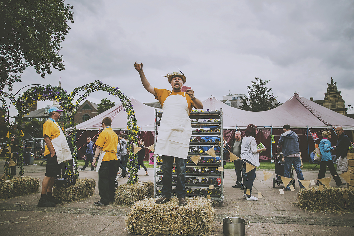 ANDY TRAIN ASKS EVERYONE TO RAISE THEIR GLASSES AT THE